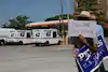 Demonstrators march outside a post office in Royal Oak, Mich., on Aug. 2, 2020.