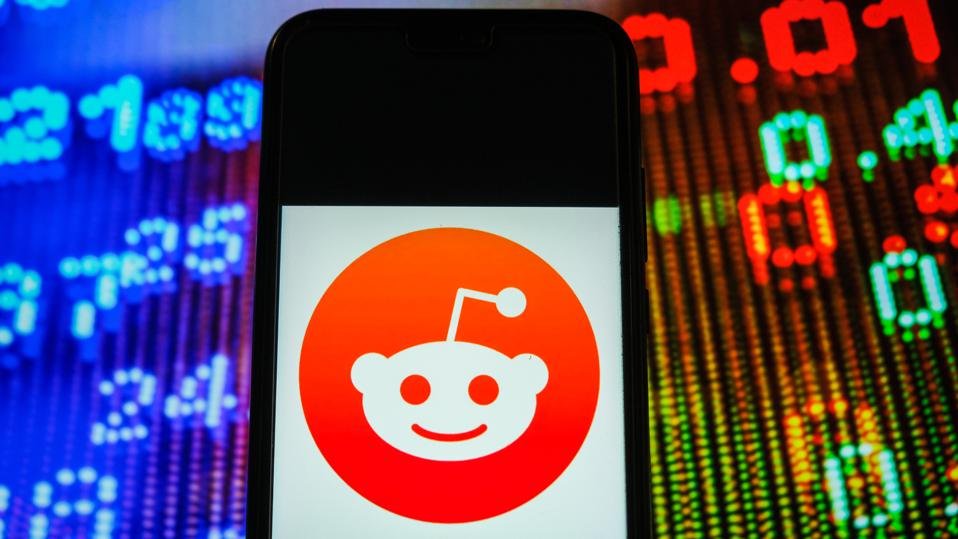 In this photo illustration, a Reddit logo seen displayed on...