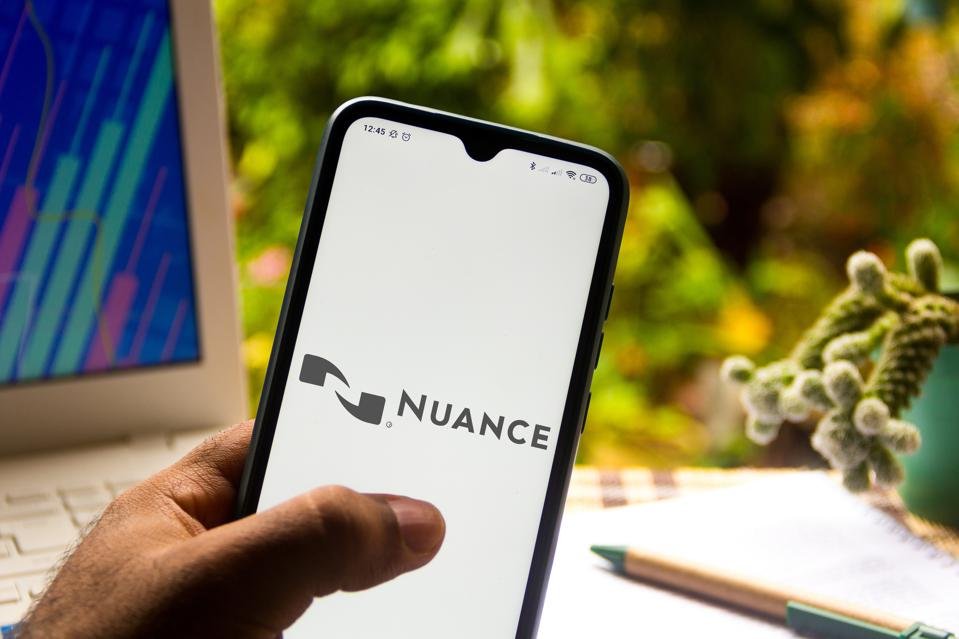 In this photo illustration the Nuance Communications logo...